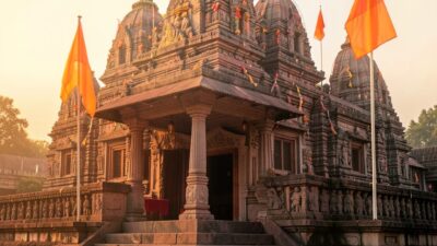 Saffron flags at a Hindu temple at dawn, symbolic sacred atmosphere for Lord Hanuman